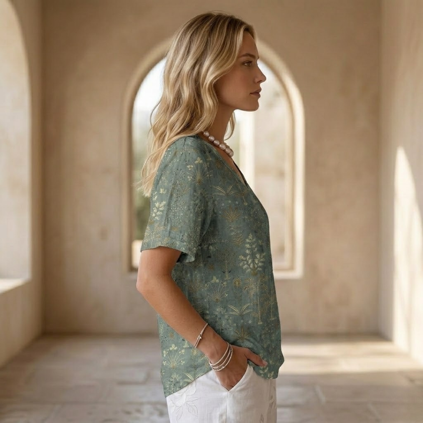 FJØRNA men's top in dark color, featuring a comfortable fit and stylish design, shown on a plain background.