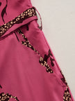 Rose red leopard print chiffon jumpsuit with long sleeves and a relaxed fit, designed by FJØRNA.