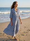 FJØRNA women's summer midi dress with a colorful print and wrap design, perfect for warm-weather casual wear.