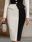 FJØRNA black and white tailored pencil dress for women, featuring a classic contrast design and fitted silhouette.