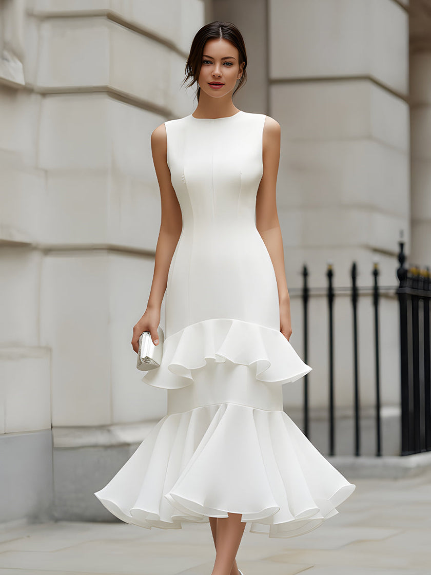 FJØRNA sleeveless tiered ruffle midi dress with flowing fabric and layered design, perfect for summer or special occasions.