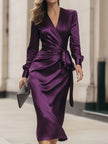 FJØRNA deep purple satin wrap midi dress for women, elegant sleeveless dress with a fitted waist and flowing skirt.