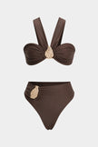 FJØRNA women's asymmetrical bikini set with unique design, featuring a stylish swimwear top and bottom for beach or pool use.