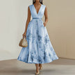 FJØRNA women's white sleeveless pleated dress with a printed V-neck design, perfect for casual or summer wear.