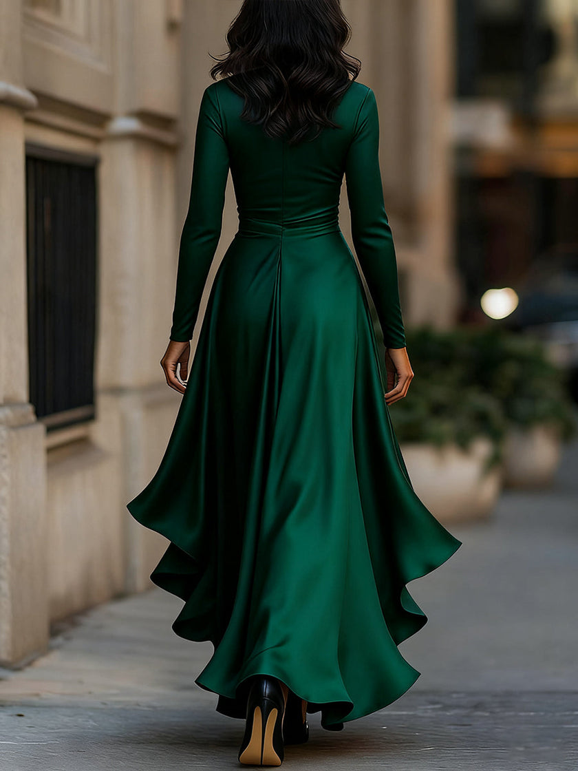 FJØRNA midnight blue satin maxi dress with draped fabric and ruffle details, perfect for elegant evening occasions.
