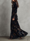 FJØRNA velvet floral midnight evening dress with long sleeves and elegant floral pattern, suitable for formal occasions.