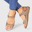 FJØRNA orthopedic ankle-length open toe comfort sandals with supportive design and cushioned footbed, shown in beige on model.