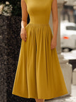 FJØRNA two-way convertible high-neck draped midi dress for women, showcasing a stylish, elegant design with flowing fabric and versatile neckline.