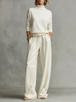 FJØRNA women's lightweight summer trousers with wide leg design and belt, stylish and comfortable for warm weather.
