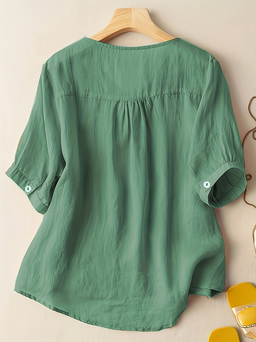 FJØRNA women's summer V-neck linen blouse with a flowy, casual fit, featuring short sleeves and a relaxed style.