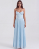 Women's strapless pleated maxi dress with corset bodice by FJØRNA, featuring flowing fabric and elegant design.