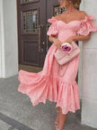 Pink FJØRNA off-shoulder midi dress for women, elegant A-line style, showcasing the flowing fabric and stylish neckline.