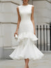 FJØRNA sleeveless tiered ruffle midi dress with flowing fabric and layered ruffle details, perfect for summer occasions.