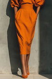 White FJØRNA puff sleeve high-waisted midi dress with pockets, casual style, elegant design, perfect for everyday wear.