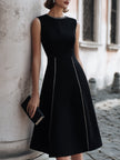 FJØRNA sleeveless A-line midi dress with chain-trim seams, showcasing a stylish and elegant dress silhouette.