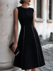FJØRNA sleeveless A-line midi dress with chain-trim seams, showcasing a stylish and elegant dress silhouette.