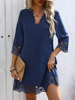 FJØRNA white A-line mini dress with loose fit, hollow design, V-neck, and solid color, suitable for casual or semi-formal wear.