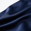 FJØRNA satin halter neck wrap maxi dress with bow tie waist and ruffled hem, elegant evening dress in lush fabric.