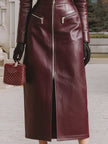 FJØRNA burgundy leather zip-front midi coat dress showcasing edgy sophistication and sleek design.