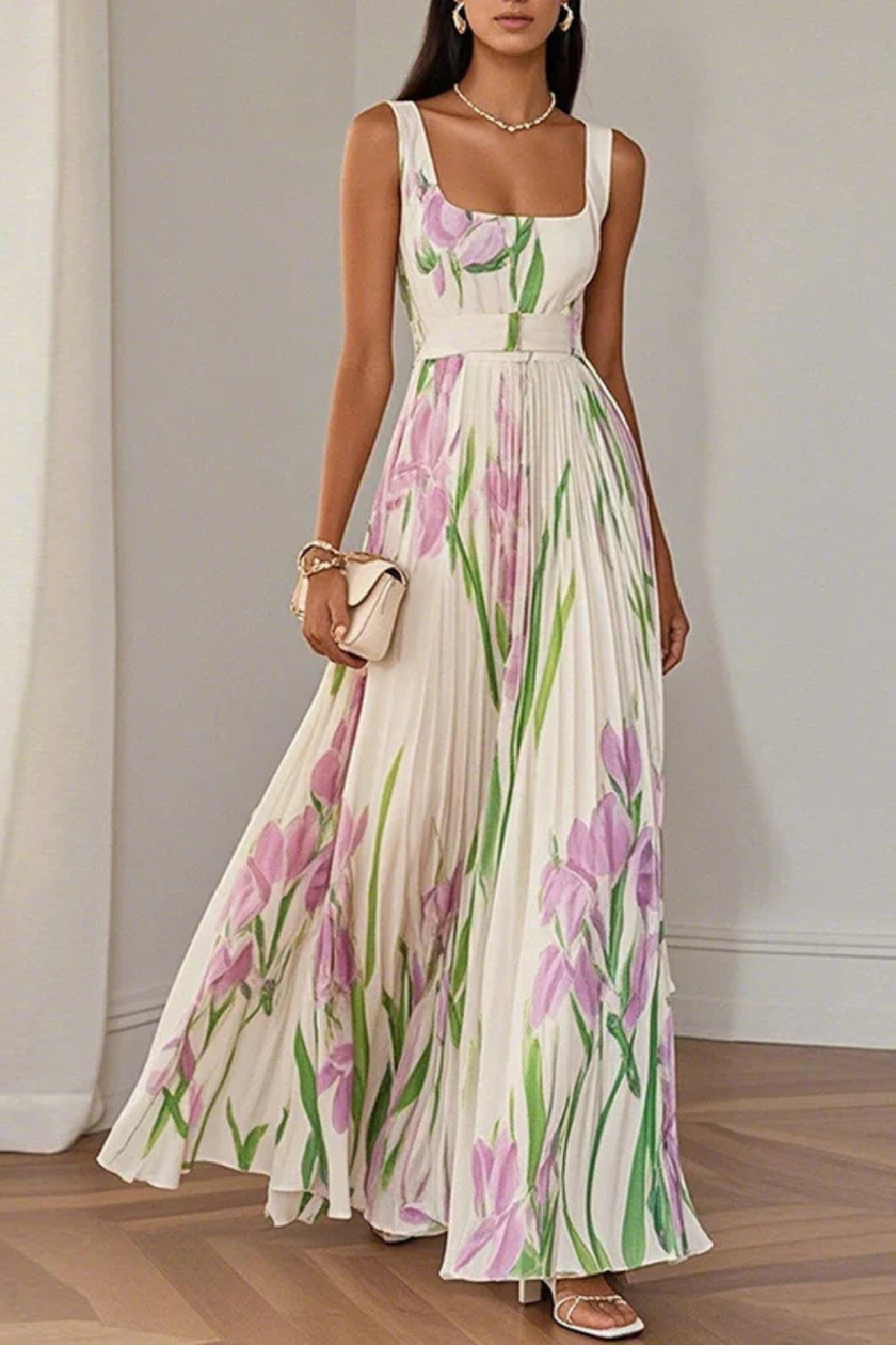 White floral print square neck pleated maxi dress by FJØRNA, featuring a flowing design and elegant floral pattern.