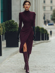 Deep burgundy FJØRNA draped wrap midi dress with long sleeves and elegant silhouette, displayed on a mannequin.