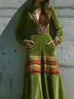 Olive green velvet maxi dress with striped hem by FJØRNA, featuring boho style and flowing silhouette.