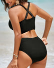 FJØRNA women's bikini set featuring a flattering fit, with a stylish top and matching bottoms, perfect for summer swimwear.