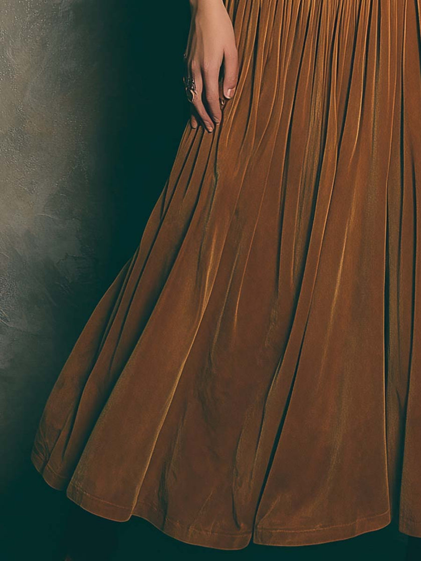 FJØRNA vintage caramel swan maxi dress with spaghetti straps, flowing fabric and elegant design for stylish summer wear.