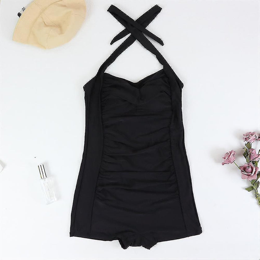 FJØRNA women's shaping halter swimsuit with pleated fit, featuring a stylish design and supportive swimwear for women.