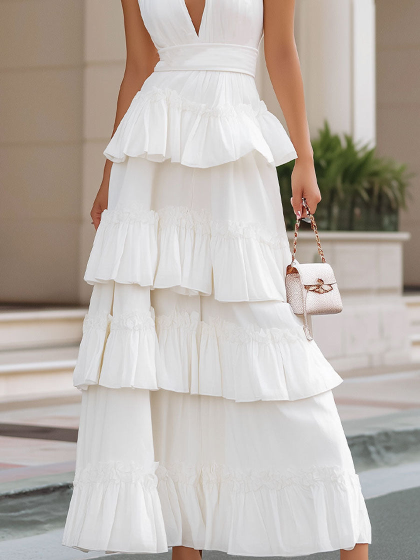 FJØRNA ivory tiered halter maxi dress for women with flowing fabric and elegant design, perfect for summer events.