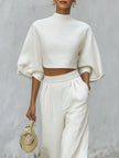 Cream textured lantern sleeve two-piece pants set by FJØRNA featuring a stylish top and matching trousers.