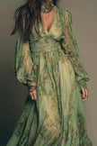 FJØRNA botanical print V-neck long-sleeved fitted waist casual maxi dress displayed on a model.