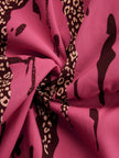Rose red leopard print chiffon jumpsuit with long sleeves from FJØRNA, featuring a stylish and flowy design.