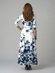 FJØRNA women's summer floral maxi dress with v-neck wrap design, lightweight and stylish for warm-weather occasions.