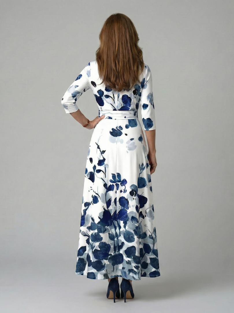 FJØRNA women's summer floral maxi dress with v-neck wrap design, lightweight and stylish for warm-weather occasions.