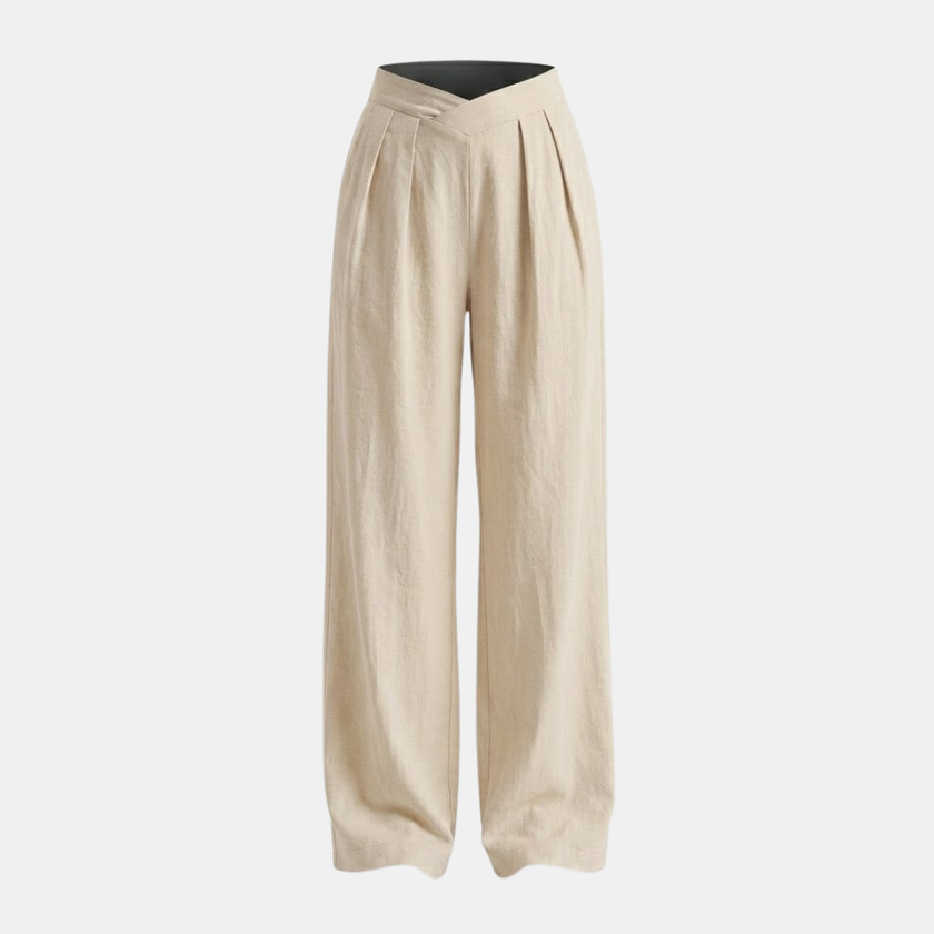 Women’s FJØRNA criss cross waist wide-leg trousers, showing the stylish high waist and flowing wide-leg design on a model.