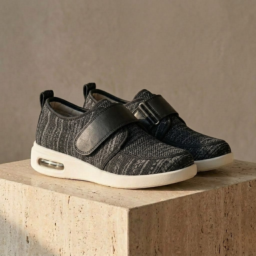 FJØRNA men's red mesh trainers with breathable design and velcro closure, ideal for comfortable casual wear.