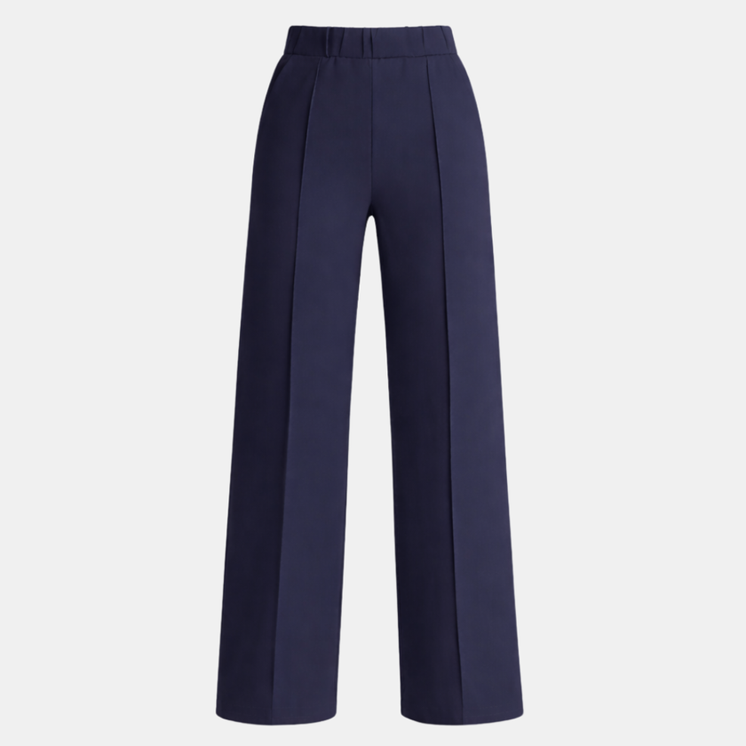 FJØRNA women's wide leg high waist tailored pants, shown in a natural pose highlighting the relaxed fit and elegant design.