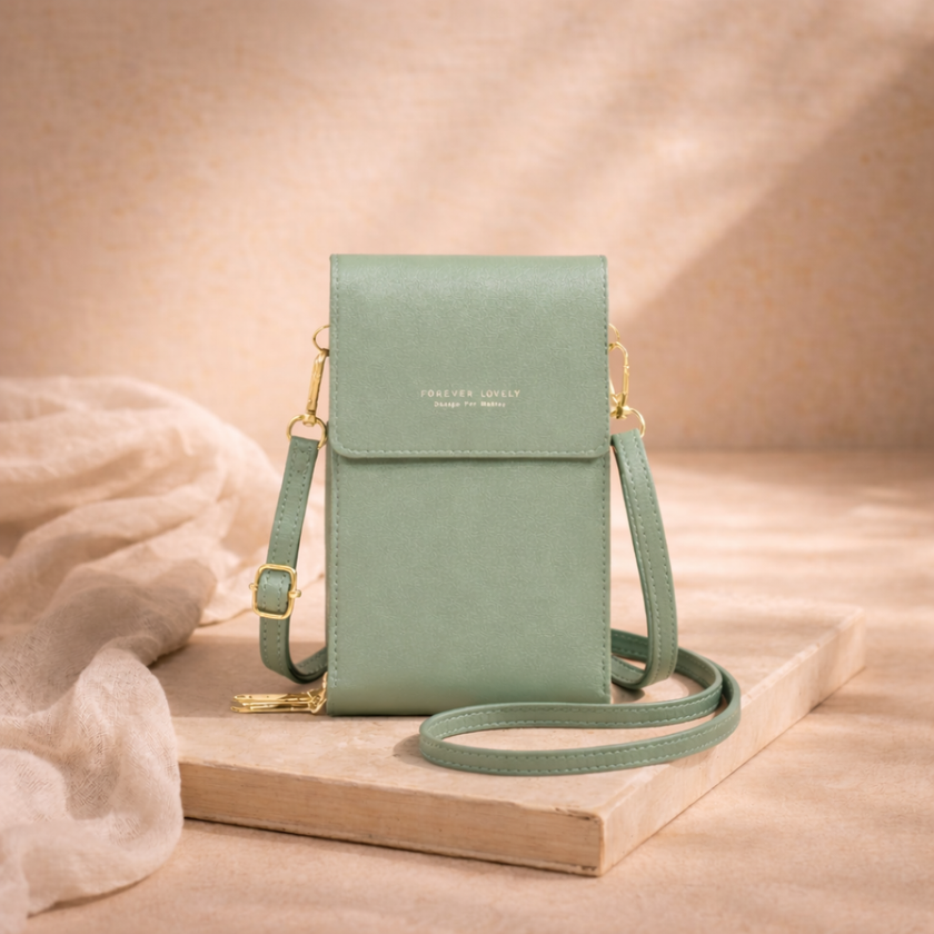 FJØRNA women's crossbody bag with adjustable strap and spacious interior, stylish accessory for daily use.