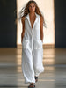 White linen sleeveless wide-leg jumpsuit for women by FJØRNA, featuring a relaxed fit and stylish design.