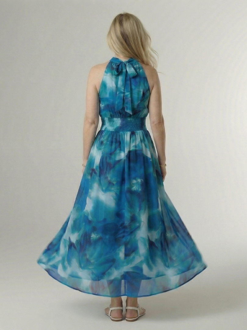 FJØRNA women's summer midi dress with halter neck, sleeveless casual style, lightweight fabric, and relaxed fit.