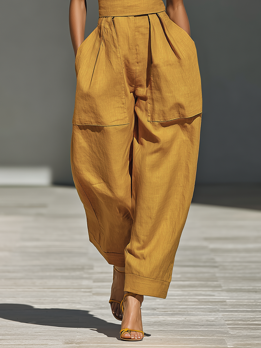 FJØRNA mustard linen-blend women's jumpsuit with crisscross neckline, relaxed fit, wide-leg pants, casual stylish attire