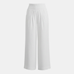 FJØRNA women's high waist wide leg trousers with elastic waistband, showing the relaxed fit and smooth fabric.