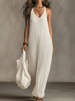 Olive green FJØRNA sleeveless knit maxi dress with casual fit, featuring a flowing silhouette and simple neckline.