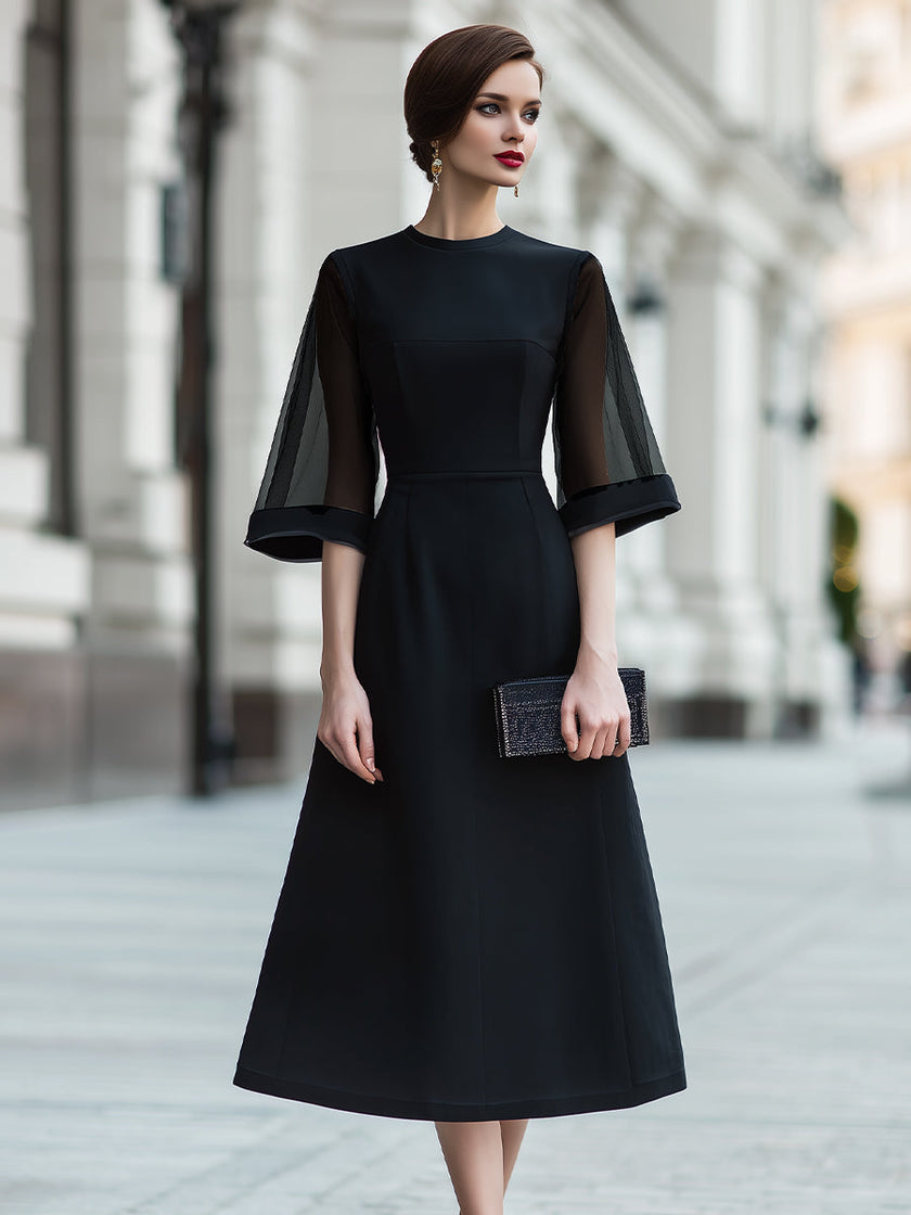 FJØRNA sheer sleeve midi dress with structured waist, showcasing elegant design and lightweight fabric for stylish wear.