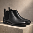 FJØRNA men's leather Chelsea boots with elastic side panels and sleek design, stylish men's shoes for casual or formal wear.