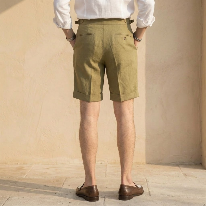 Men's high waist linen shorts with pleats by FJØRNA, featuring a relaxed fit and lightweight fabric for casual summer wear.