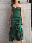 FJØRNA ruffled tiered satin midi gown with sculpted bodice, featuring flowing ruffles and elegant design for formal occasions.