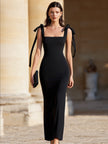 FJØRNA bow-shoulder square-neck evening dress for women, stylish square-neckline with bow shoulder detail, elegant black dress.