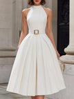Ivory FJØRNA halter neck pleated midi dress for women, featuring a flowing white fabric and elegant design.